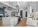 Modern kitchen with a large island, stainless steel appliances, and ample counter space at 3949 Plainview Rd, Charlotte, NC 28208
