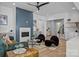 Bright living room featuring a stylish fireplace, comfortable seating, and an open layout at 3949 Plainview Rd, Charlotte, NC 28208