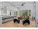 Bright and airy living space featuring an open layout, modern decor, and access to the kitchen at 3949 Plainview Rd, Charlotte, NC 28208