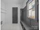Well-organized mudroom with built-in bench, hooks, and storage, offering style and functionality at 3949 Plainview Rd, Charlotte, NC 28208