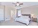 Neutral Primary bedroom with large windows, carpeted floor, and ensuite bathroom at 4017 Avis Way, Monroe, NC 28110