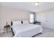 Bedroom featuring a bed, desk, closet and window at 4017 Avis Way, Monroe, NC 28110