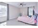 Charming bedroom features natural light, soft colors, and a comfortable bed, creating a peaceful retreat at 4017 Avis Way, Monroe, NC 28110