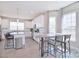 Bright, open kitchen featuring a center island, modern appliances, ample counter space, and a breakfast nook at 4017 Avis Way, Monroe, NC 28110