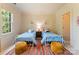 Charming bedroom featuring twin beds with colorful accents and plenty of natural light at 4023 Alexandra Alley Dr, Charlotte, NC 28210