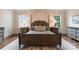 Bedroom featuring natural lighting, neutral walls and hardwood flooring at 4023 Alexandra Alley Dr, Charlotte, NC 28210