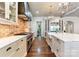 State-of-the-art kitchen features custom cabinets, an island and top-of-the-line appliances at 4023 Alexandra Alley Dr, Charlotte, NC 28210