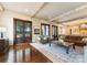 Open living room showcasing hardwood floors, exposed beams, and stylish furnishings at 4023 Alexandra Alley Dr, Charlotte, NC 28210