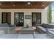 Inviting outdoor patio with comfortable seating, a ceiling fan, and easy access to the home's interior at 4023 Alexandra Alley Dr, Charlotte, NC 28210