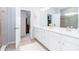 Elegant bathroom with a double vanity, a walk-in shower, and a large mirror at 4268 Coachwhip Ave, Lancaster, SC 29720