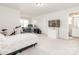 Large bedroom featuring a bed, desk area, television, and an ensuite bathroom at 4268 Coachwhip Ave, Lancaster, SC 29720