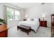 Cozy bedroom featuring large windows, neutral decor, and comfortable furnishings at 4268 Coachwhip Ave, Lancaster, SC 29720