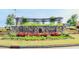 Stone community entrance sign with lush landscaping and pergola, welcoming residents to Walnut Creek at 4268 Coachwhip Ave, Lancaster, SC 29720