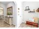Bright foyer features a console table, decor, and bench seating creating a welcoming atmosphere at 4268 Coachwhip Ave, Lancaster, SC 29720