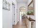 Bright hallway features stylish floors and decor, leading to an open-concept dining and living area at 4268 Coachwhip Ave, Lancaster, SC 29720
