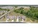 Street view of new homes with well-maintained lawns and landscaping, showcasing the neighborhood's curb appeal at 4268 Coachwhip Ave, Lancaster, SC 29720