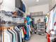 Large walk-in closet with custom shelving, hanging rods, and ample storage space at 4268 Coachwhip Ave, Lancaster, SC 29720