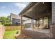Backyard patio offering a charming outdoor seating area with a lovely view at 4900 Doris Ave, Charlotte, NC 28205