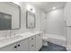 Modern bathroom with double vanity, sleek tile floors, and bathtub/shower combo at 4900 Doris Ave, Charlotte, NC 28205