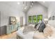 Spacious bedroom featuring neutral walls, large windows and decorative lighting at 4900 Doris Ave, Charlotte, NC 28205