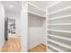 Spacious walk-in closet with custom shelving and ample storage space at 4900 Doris Ave, Charlotte, NC 28205