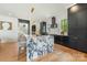 Bright kitchen with marble island, stainless appliances, and hardwood floors at 4900 Doris Ave, Charlotte, NC 28205