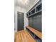 Well-organized mudroom with built-in storage, a bench, and stylish design details at 4900 Doris Ave, Charlotte, NC 28205