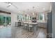 Spacious kitchen features a large island, stainless steel appliances, and modern pendant lighting at 5499 Angus Dr, Midland, NC 28107