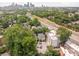 Panoramic aerial view of the neighborhood with the city skyline in the background on a sunny day at 558 Oakland Ave, Charlotte, NC 28204