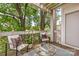 Relax on this cozy balcony with comfortable seating and a beautiful outdoor view at 558 Oakland Ave, Charlotte, NC 28204