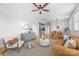 Open living space connects kitchen, featuring stylish decor and hardwood floors at 558 Oakland Ave, Charlotte, NC 28204