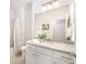 Stylish bathroom featuring a granite countertop, ample lighting, and modern fixtures for a clean and inviting space at 7739 Village Pkwy, Locust, NC 28097