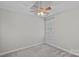 The room features neutral walls, carpet, a ceiling fan, and a window with blinds at 807 Water Wheel Ct, Charlotte, NC 28209