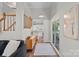 Hallway view of staircase, kitchen and sliding glass doors to a deck at 807 Water Wheel Ct, Charlotte, NC 28209