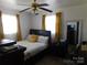 Cozy bedroom featuring a comfortable bed, soft lighting, and ample space for relaxation at 814 Aileen Cir, Pineville, NC 28134