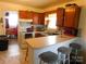 Kitchen with breakfast bar, providing extra seating and counter space for casual dining at 814 Aileen Cir, Pineville, NC 28134
