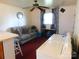 Combined laundry and living area, maximizing space with a comfortable seating area at 814 Aileen Cir, Pineville, NC 28134