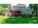 Exterior of home featuring a second story deck with steps leading to yard at 841 16Th Avenue Nw Ln, Hickory, NC 28601