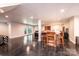 Open basement area featuring polished floors, recessed lighting, and access to the backyard at 841 16Th Avenue Nw Ln, Hickory, NC 28601