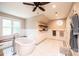 Bright bathroom with a soaking tub, tiled floor, a large window, and modern fixtures at 841 16Th Avenue Nw Ln, Hickory, NC 28601