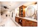Spacious bathroom featuring dual sinks, marble countertops, a soaking tub, and a walk-in shower at 841 16Th Avenue Nw Ln, Hickory, NC 28601
