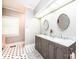 Bathroom featuring double sinks, marble countertops, and modern fixtures at 841 16Th Avenue Nw Ln, Hickory, NC 28601