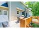 A spacious deck with a dining table, awning, and a gas grill at 841 16Th Avenue Nw Ln, Hickory, NC 28601