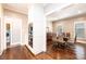 Dining room with hardwood floors, glass table, and stainless steel oven and cabinets at 841 16Th Avenue Nw Ln, Hickory, NC 28601