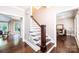 Elegant entryway with hardwood floors and a classic staircase leading to the upper level at 841 16Th Avenue Nw Ln, Hickory, NC 28601