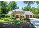 Charming two-story home featuring a well-manicured lawn and a three-car garage at 841 16Th Avenue Nw Ln, Hickory, NC 28601