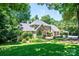 Exterior of charming home with lush green landscaping and a spacious lawn at 841 16Th Avenue Nw Ln, Hickory, NC 28601