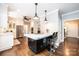 Bright kitchen with stainless steel appliances, a marble island, and an open layout at 841 16Th Avenue Nw Ln, Hickory, NC 28601