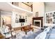 Spacious living room with fireplace, built-ins, second story balcony, and hardwood floors at 841 16Th Avenue Nw Ln, Hickory, NC 28601