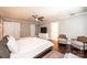 Bedroom with hardwood floors, ceiling fan, and sitting area at 841 16Th Avenue Nw Ln, Hickory, NC 28601